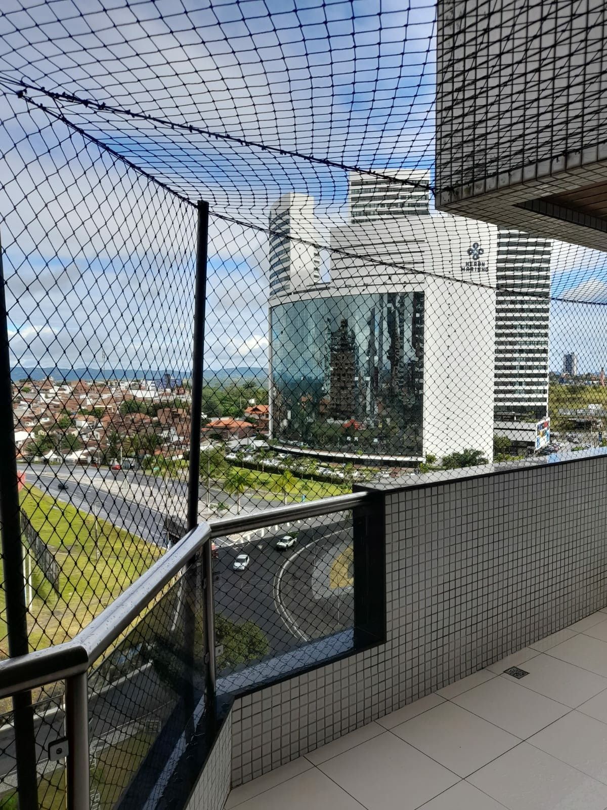 Construction safety nets installed on high-rise building site for worker protection