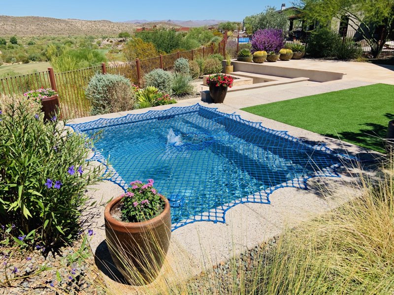 Swimming pool safety net installation for child and pet protection